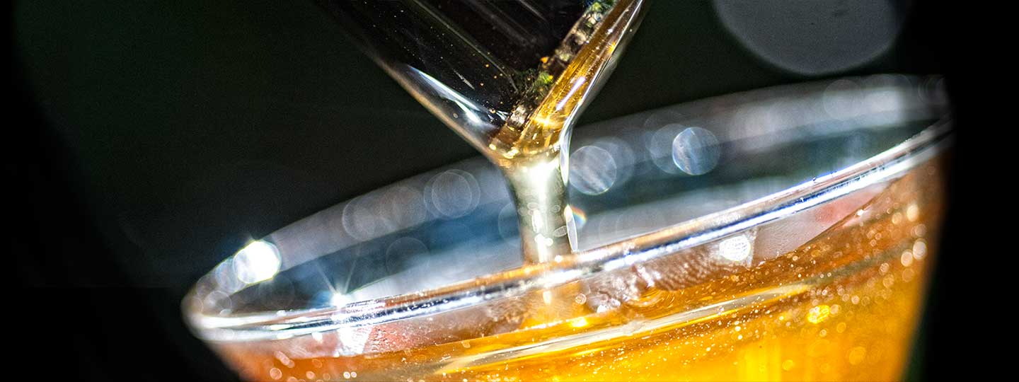 Dripping Honey into a Glass